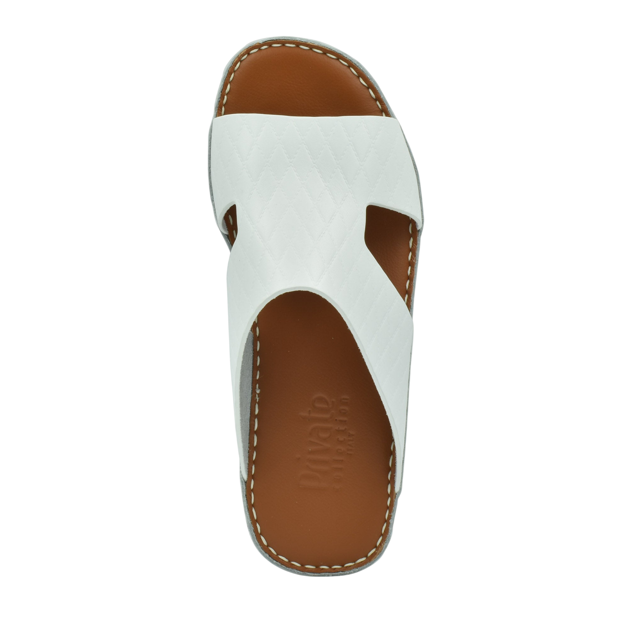 White Western style leather sandals with brown footbed and stitched detailing from Private Collection